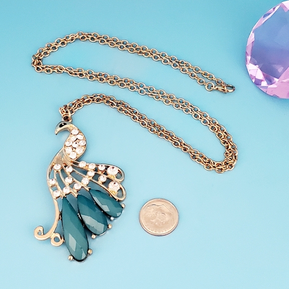 Gold tone peacock with faux teal gemstones and clear rhinestones necklace - Picture 3 of 5